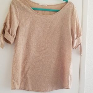 Beige top with tie sleeves